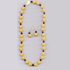 Yellow colour beads with Designer Saree